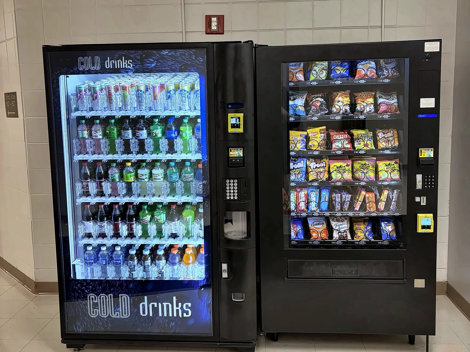 Snack and beverage vending machines installed in a school